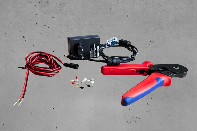 Power supply, wire end ferrules, and crimping pliers
